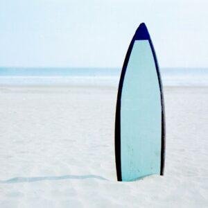 surfboard on seashore
