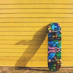 photo of blue multicolored skateboard